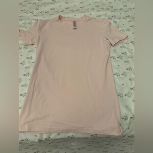 “New vintage t-shirt” from skims in the color cherry blossom.